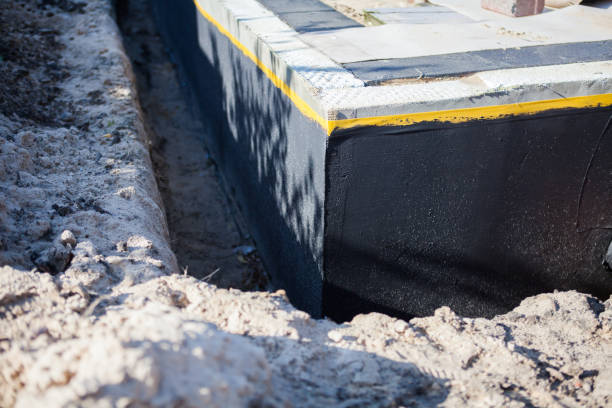 Professional Waterproofing technician working in Milledgeville, OH